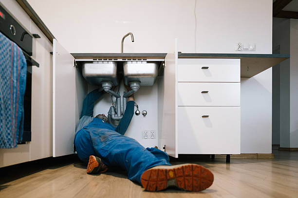 Professional Drain Cleaning technician working in Claremont, MN